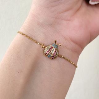 Bratara Martisor buburuza, placat cu aur, decorat cu cristale Cubic Zirconia