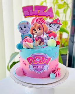 Topper frontal de tort cu logo Patrula Catelusilor roz cu