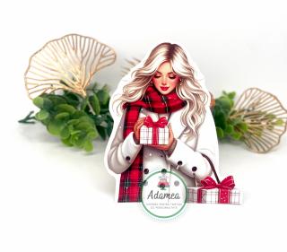 Topper frontal de tort cu tanara blonda oferind un cadou de Craciun