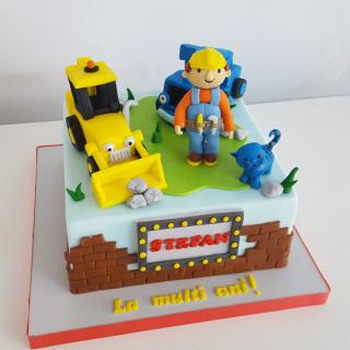 Tort baietel si buldozere