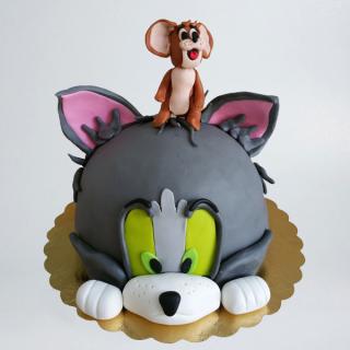 Tort Jerry in capul lui Tom